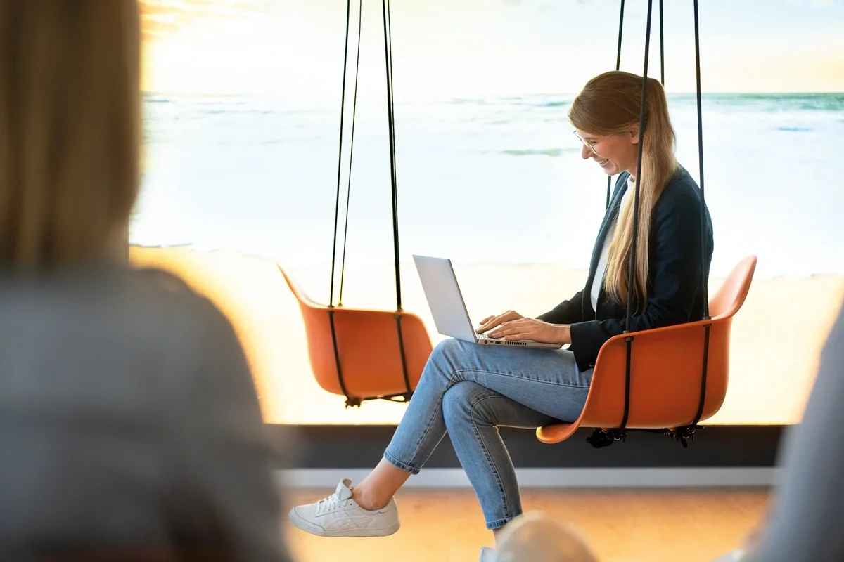 Picture - Woman in a hanging chair